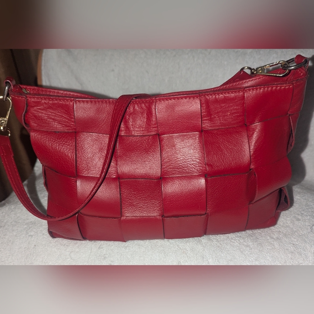 Anna Paola red woven leather crossbody bag.